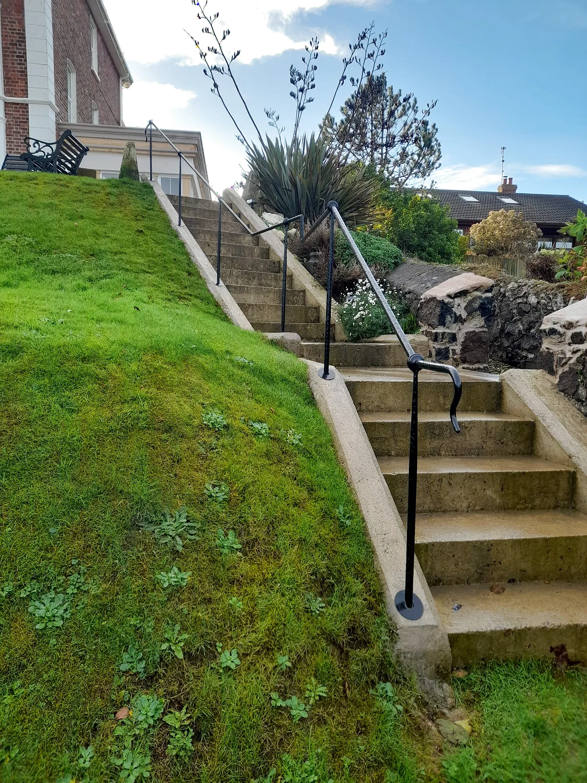 Forged Handrail · Stone Steps